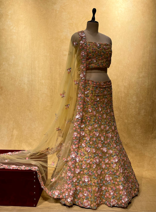 ( DELIVERY IN 25 DAYS ) YELLOW COLOR NET HAND EMBROIDERED LEHENGA WITH UNSTITCHED BLOUSE EMBELLISHED WITH CUTDANA, SEQUINS & THREAD WORK