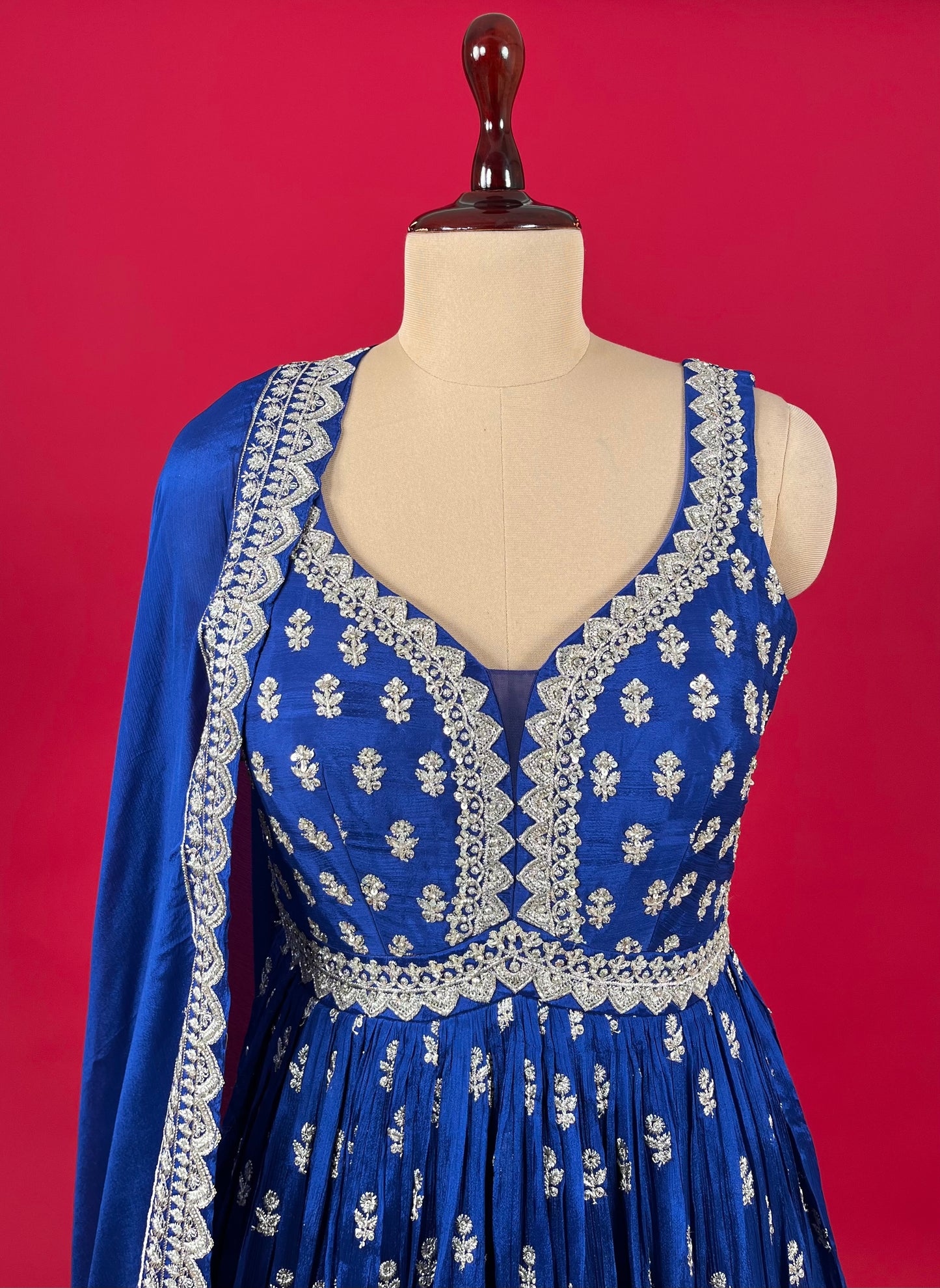 BLUE COLOUR CHINON FLOOR LENGTH ANARKALI SUIT EMBELLISHED WITH CUTDANA & ZARI WORK