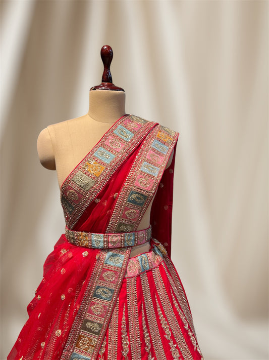 RED COLOUR SILK BRIDAL EMBROIDERED LEHENGA WITH UNSTITCHED BLOUSE & NET DUPATTA EMBELLISHED WITH  ZARDOZI AND BEAD WORK