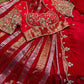 RED COLOUR CREPE SILK ZARI STRIPES LEHENGA WITH EMBROIDERED BLOUSE & SCALLOP DUPATTA EMBELLISHED WITH ZARDOZI, PEARL & CUTDANA WORK