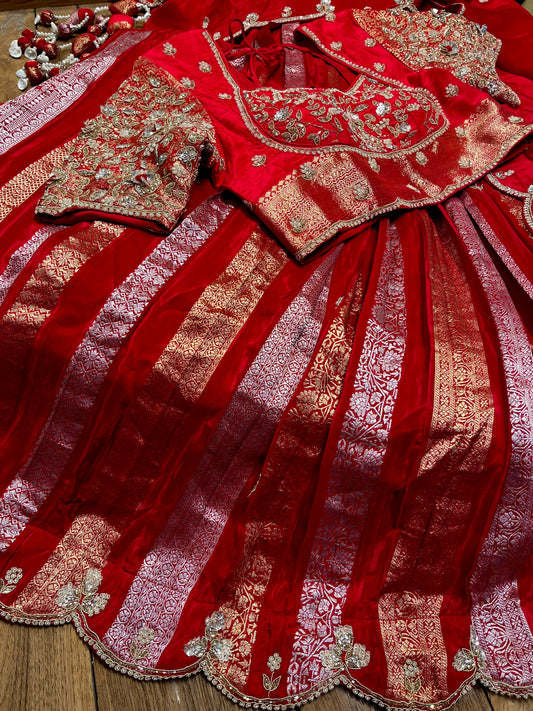 RED COLOUR CREPE SILK ZARI STRIPES LEHENGA WITH EMBROIDERED BLOUSE & SCALLOP DUPATTA EMBELLISHED WITH ZARDOZI, PEARL & CUTDANA WORK