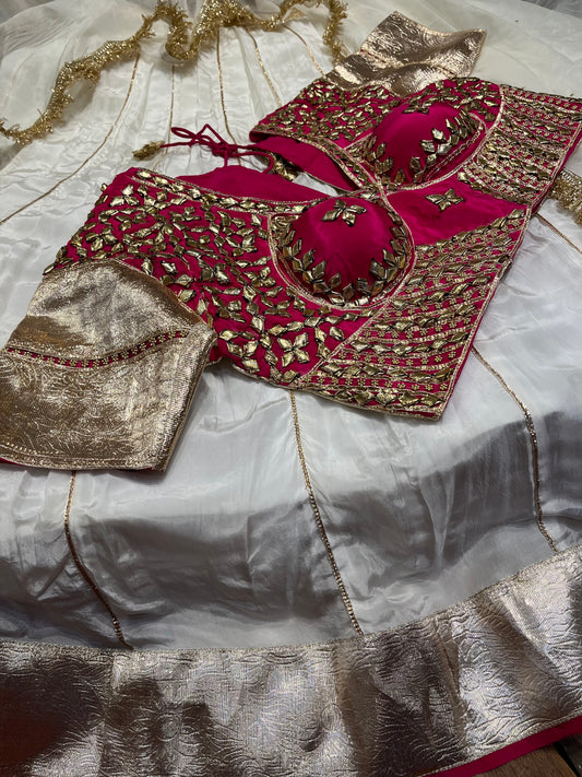 WHITE COLOUR CREPE SILK LEHENGA WITH CONTRAST READYMADE BLOUSE & ORGANZA DUPATTA EMBELLISHED WITH GOTA PATTI WORK
