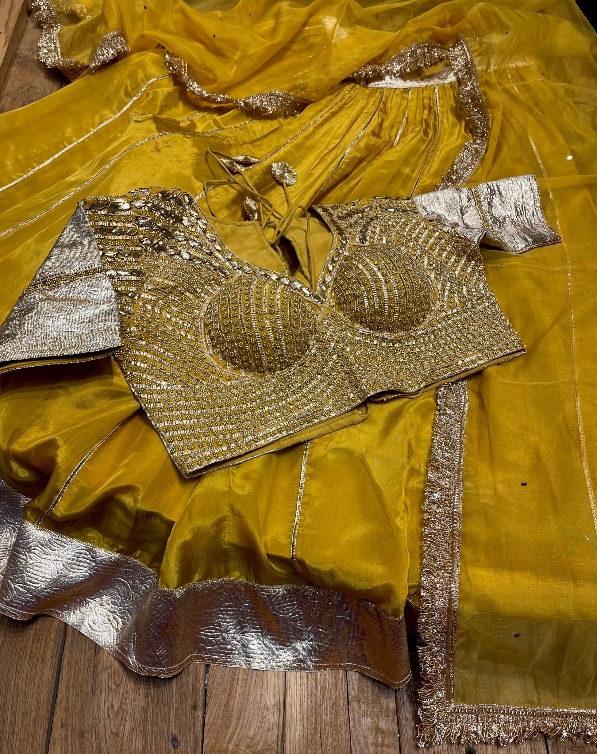 MUSTARD COLOUR CREPE SILK LEHENGA WITH READYMADE BLOUSE & ORGANZA DUPATTA EMBELLISHED WITH GOTA PATTI WORK - Kothari Sons