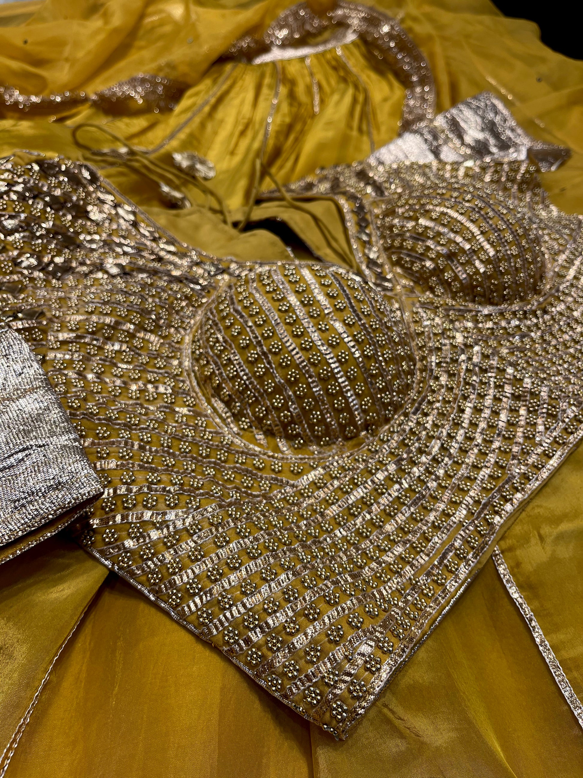 MUSTARD COLOUR CREPE SILK LEHENGA WITH READYMADE BLOUSE & ORGANZA DUPATTA EMBELLISHED WITH GOTA PATTI WORK - Kothari Sons