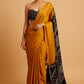 MUSTARD COLOUR MODAL SATIN SILK SAREE EMBELLISHED WITH AJRAKH PALLA & UNSTITCHED BLOUSE - Kothari Sons