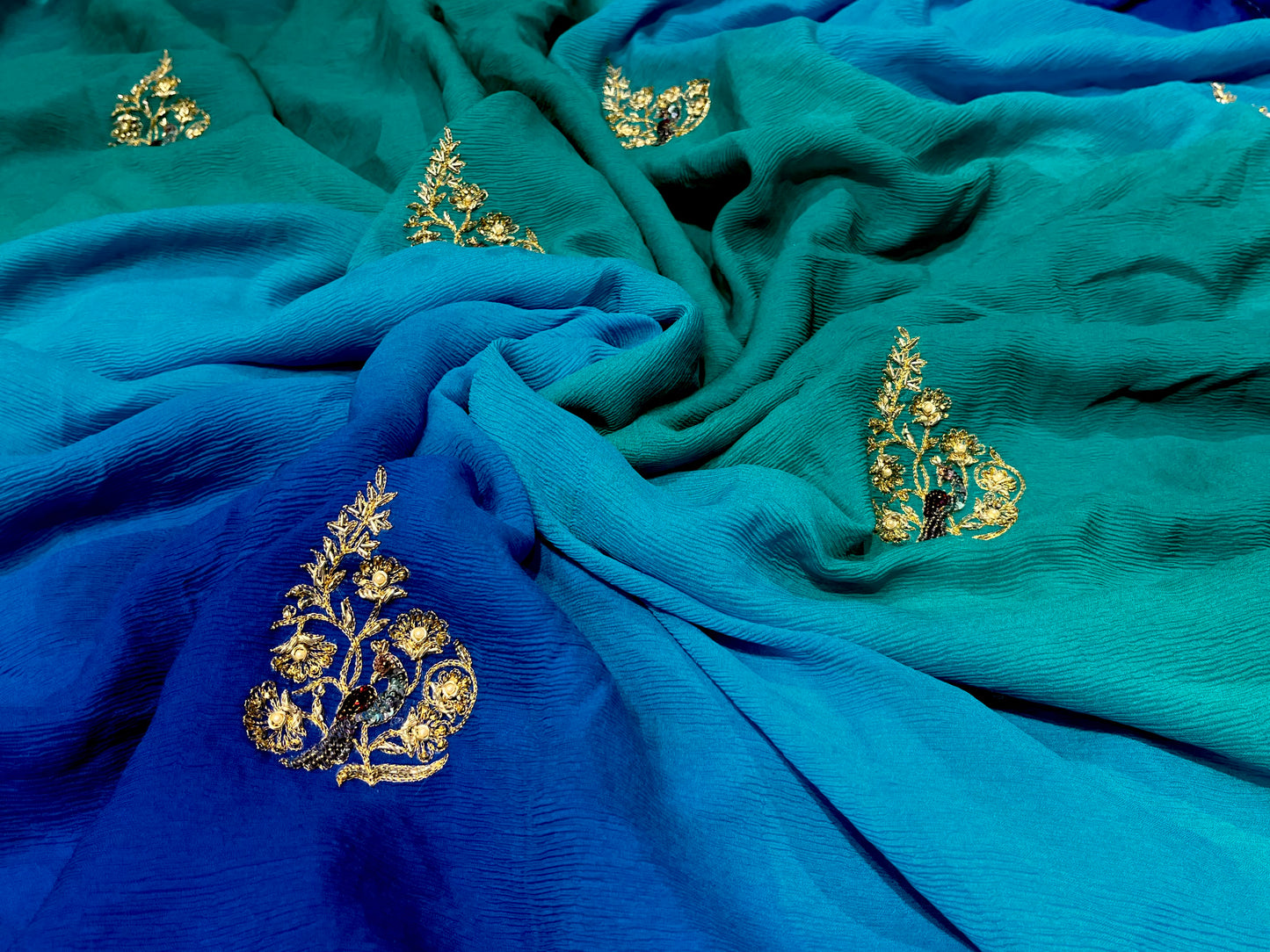 ( DELIVERY IN 25 DAYS ) BLUE SHADED PURE CHIFFON HAND EMBROIDERED SAREE EMBELLISHED WITH ZARDOZI WORK