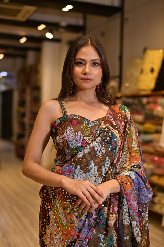 GEORGETTE MULTI COLOUR SEQUINS SAREE WITH READYMADE EMBROIDERED BLOUSE EMBELLISHED WITH CUTDANA WORK