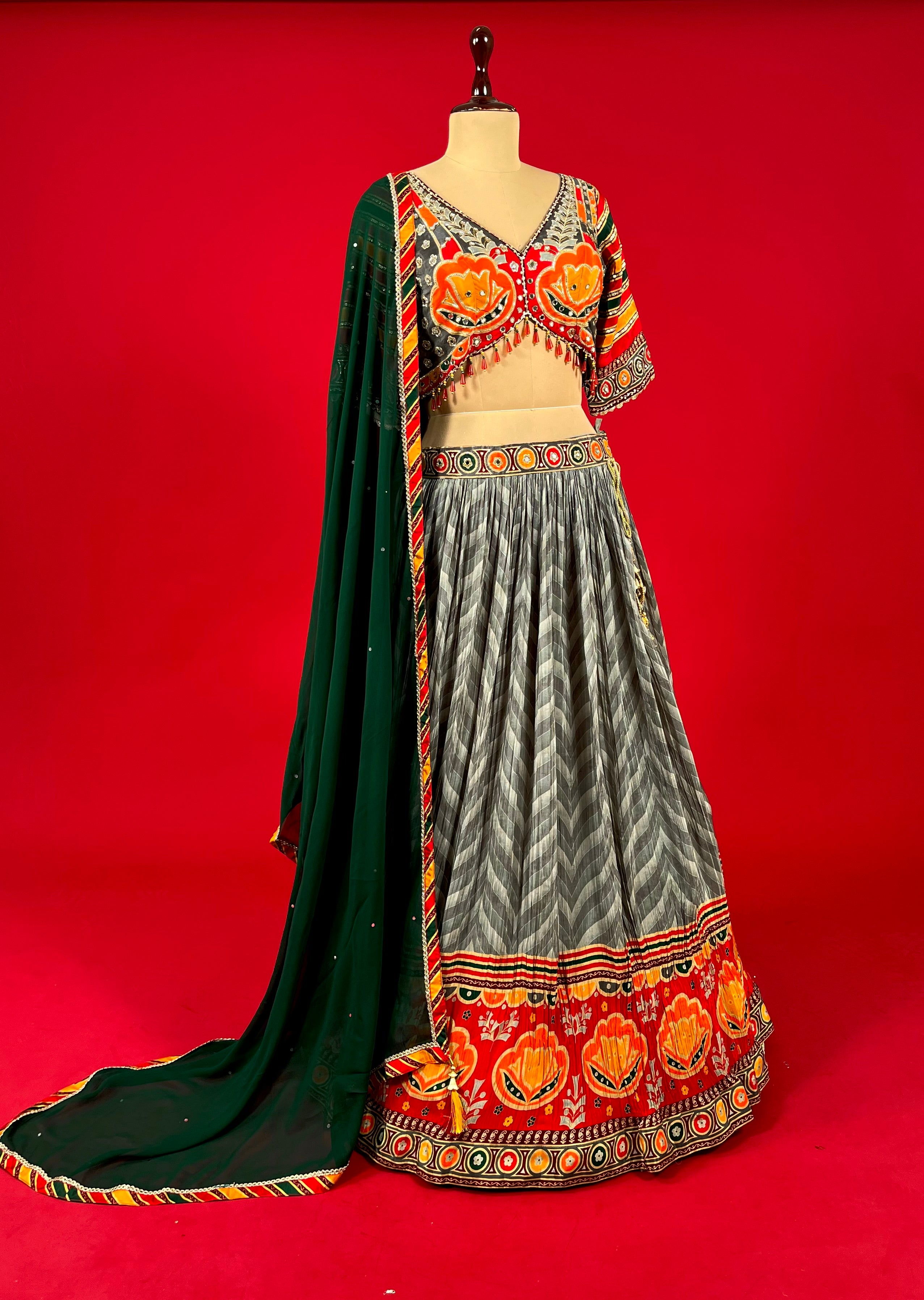 SILVER GREY LEHENGA SET WITH 3D CUTWORK AND GEOMETRICAL PATTERNS PAIRED  WITH A MATCHING BLOUSE AND DUPATTA. - Seasons India