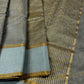 GREY COLOUR CHANDERI TISSUE SAREE WITH KIRKITA PALLA EMBELLISHED WITH ZARI WEAVES