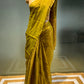 MEHENDI GREEN COLOUR CHANDERI TISSUE SAREE EMBELLISHED WITH ZARI WEAVES