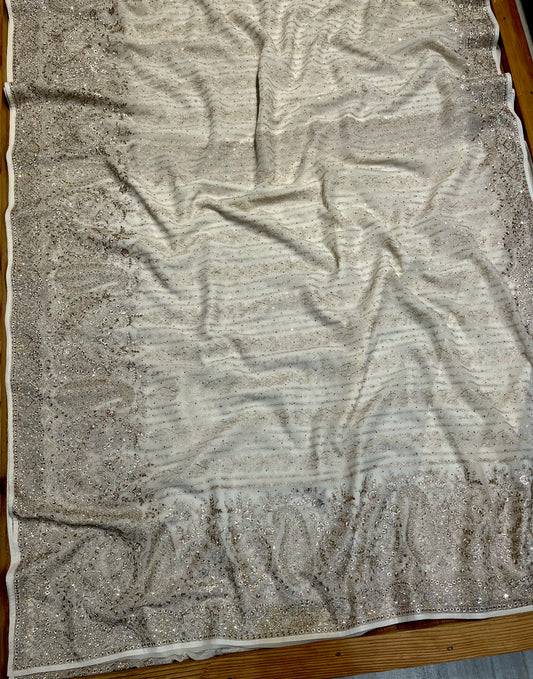 IVORY COLOUR GEORGETTE SAREE WITH ZARI AND CRYSTAL WORK