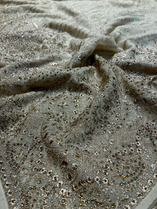 IVORY COLOUR GEORGETTE SAREE WITH ZARI AND CRYSTAL WORK