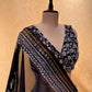 BLACK COLOUR CHINON SEQUINS LEHENGA WITH EMBROIDERED CROP TOP BLOUSE & ORGANZA DUPATTA EMBELLISHED WITH CUTDANA WORK