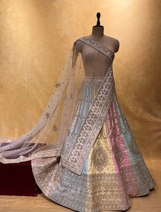 ( DELIVERY IN 25 DAYS ) MULTI COLOUR SILK EMBROIDERED LEHENGA WITH NET DUPATTA EMBELLISHED WITH KASAB EMBROIDERY
