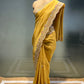 YELLOW COLOUR CREPE JACQUARD SILK EMBROIDERED SAREE EMBELLISHED WITH SEQUINS & CUTDANA WORK