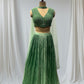 GREEN COLOR, SILK LEHENGA WITH V-NECK CROP TOP & NET DUPATTA EMBELLISHED WITH SEQUINS EMBROIDERY