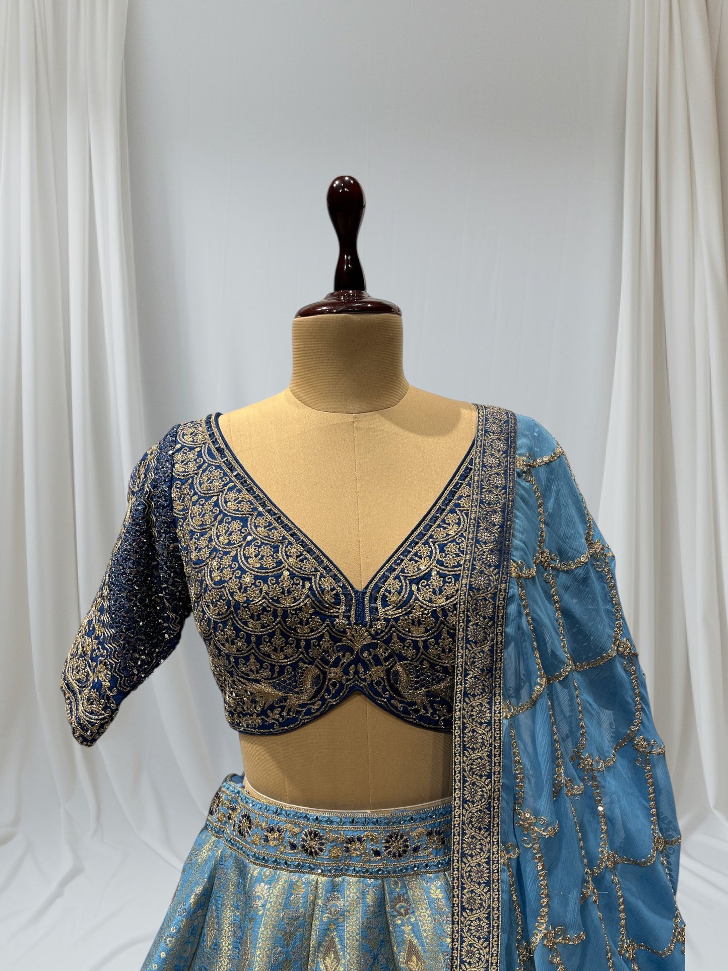 BLUE SHADED BANARASI SILK LEHENGA WITH V-NECK EMBROIDERED BLOUSE & CHIFFON EMBROIDERED DUPATTA