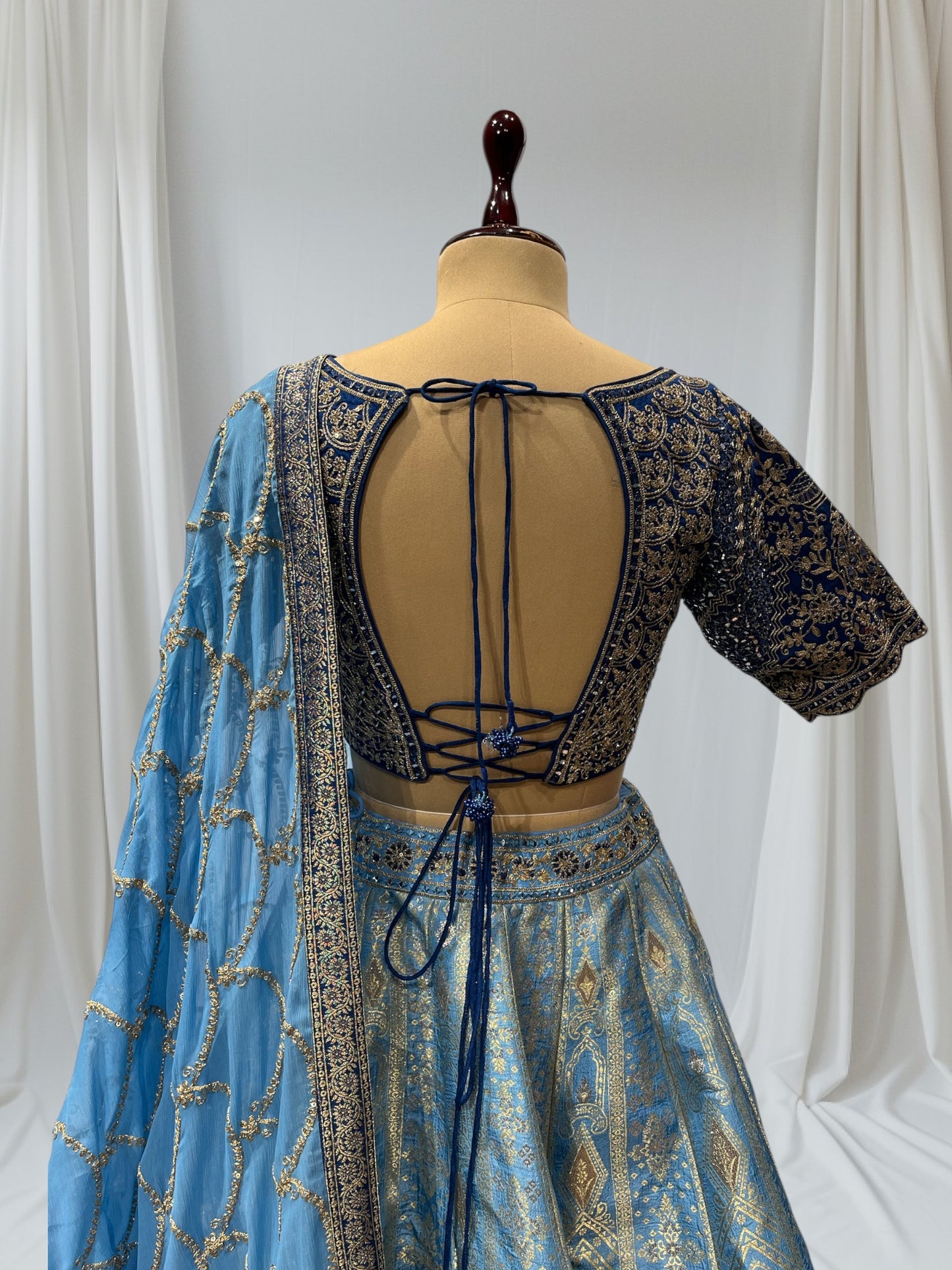 BLUE SHADED BANARASI SILK LEHENGA WITH V-NECK EMBROIDERED BLOUSE & CHIFFON EMBROIDERED DUPATTA