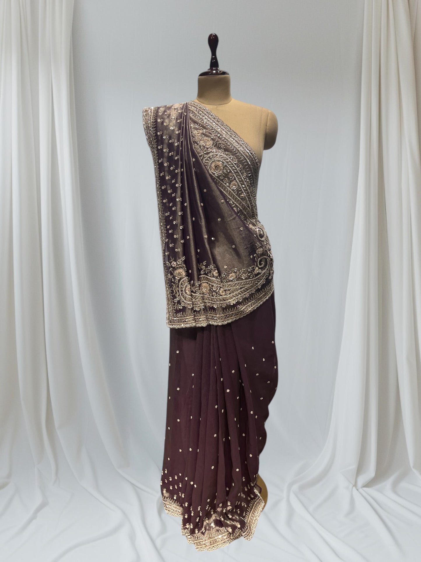 DUSTY WINE COLOR, GEOGETTE TISSUE SAREE WITH SEQUINS, PEARL & CUTDANA EMBROIDERY, PAISLEY MOTIFS ARE PLACED ON  SHOULDER AND PALLA.