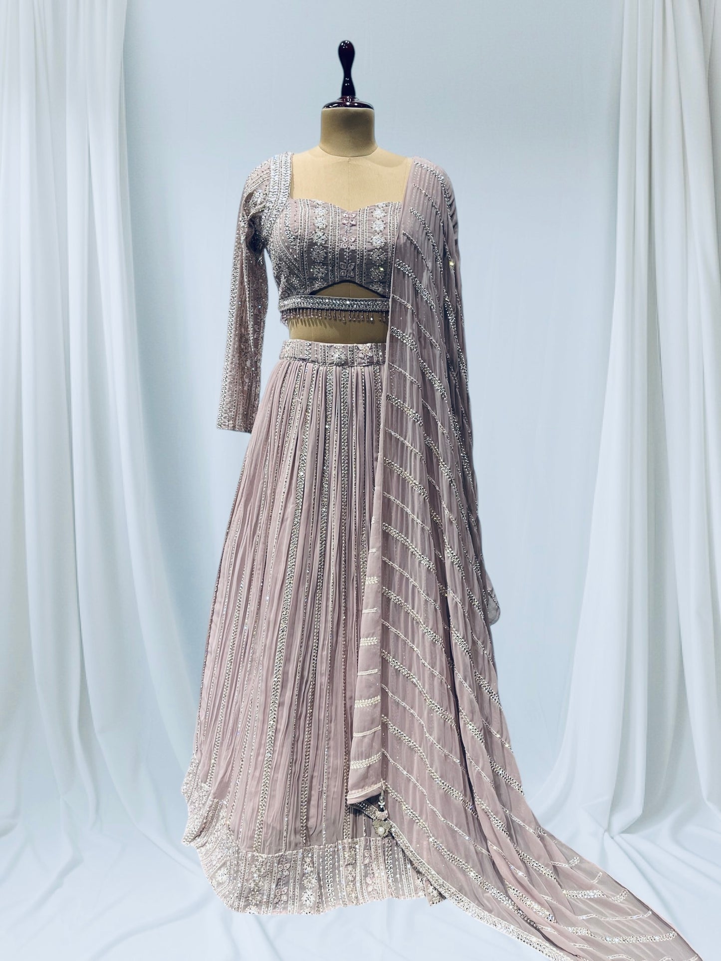 ELEGANT DUSTY LAVENDER GEORGETEE READY MADE LEHENGA WITH A CHIC CROP TOP ADORNED WITH BEADS AND TASSELS, PERFECT FOR FESTIVE CELEBRATION