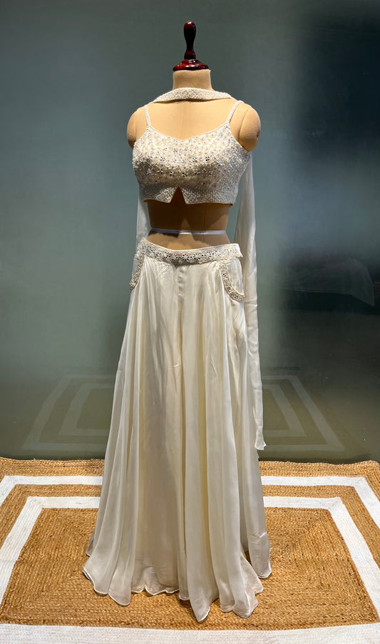 WHITE COLOUR ORGANZA PALAZZO PANT WITH EMBROIDERED CROP TOP EMBELLISHED WITH SEQUINS & CUTDANA WORK