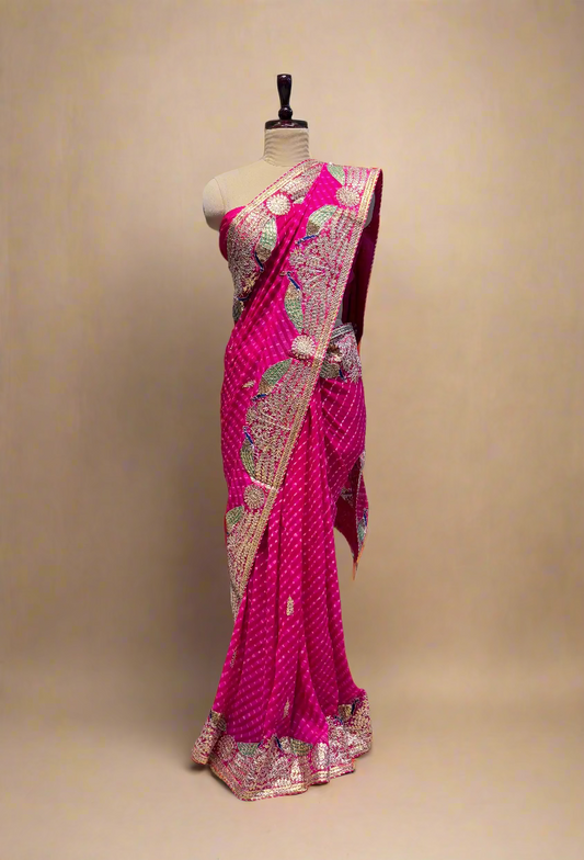 (Deliver in 30 Days) HOT PINK PURE MOTHRA LEHERIYA SAREE WITH GOTA PATTI & ZARDOZI WORK BORDER PAIRED WITH A CREPE BLOUSE