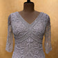 WHITE COLOUR NET HAND EMBROIDERED COCKTAIL DRESS EMBELLISHED WITH CUTDANA & SEQUINS WORK