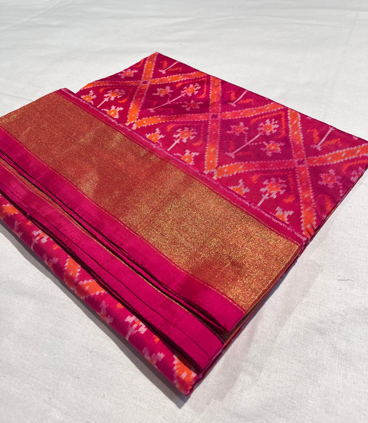 STAND OUT IN RANI PINK PURE SILK IKKAT SAREE, TIMELESS ELEGANCE