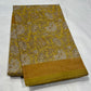 MUSTARD COLOUR SUPER NET PRINTED SAREE