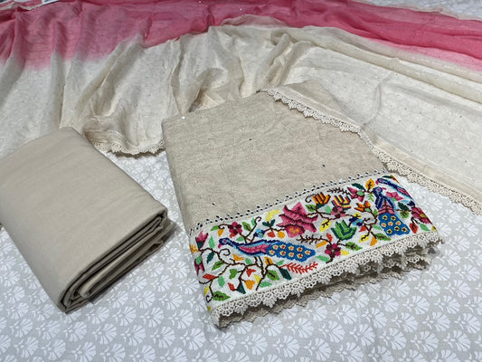 OFF WHITE COLOUR JUTE COTTON SUIT WITH CHIFFON SHADED DUPATTA EMBELLISHED WITH CROSS STITCHED EMBROIDERY