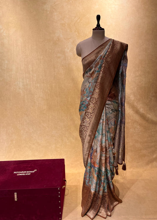 BEIGE COLOUR DOLA SILK PEACOCK PRINT SAREE WITH ZARI BORDER