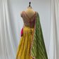 MUSTARD YELLOW SILK LEHENGA WITH SEQUINS  & BEADED V-NECK CROP TOP WITH GREEN DUPATTA