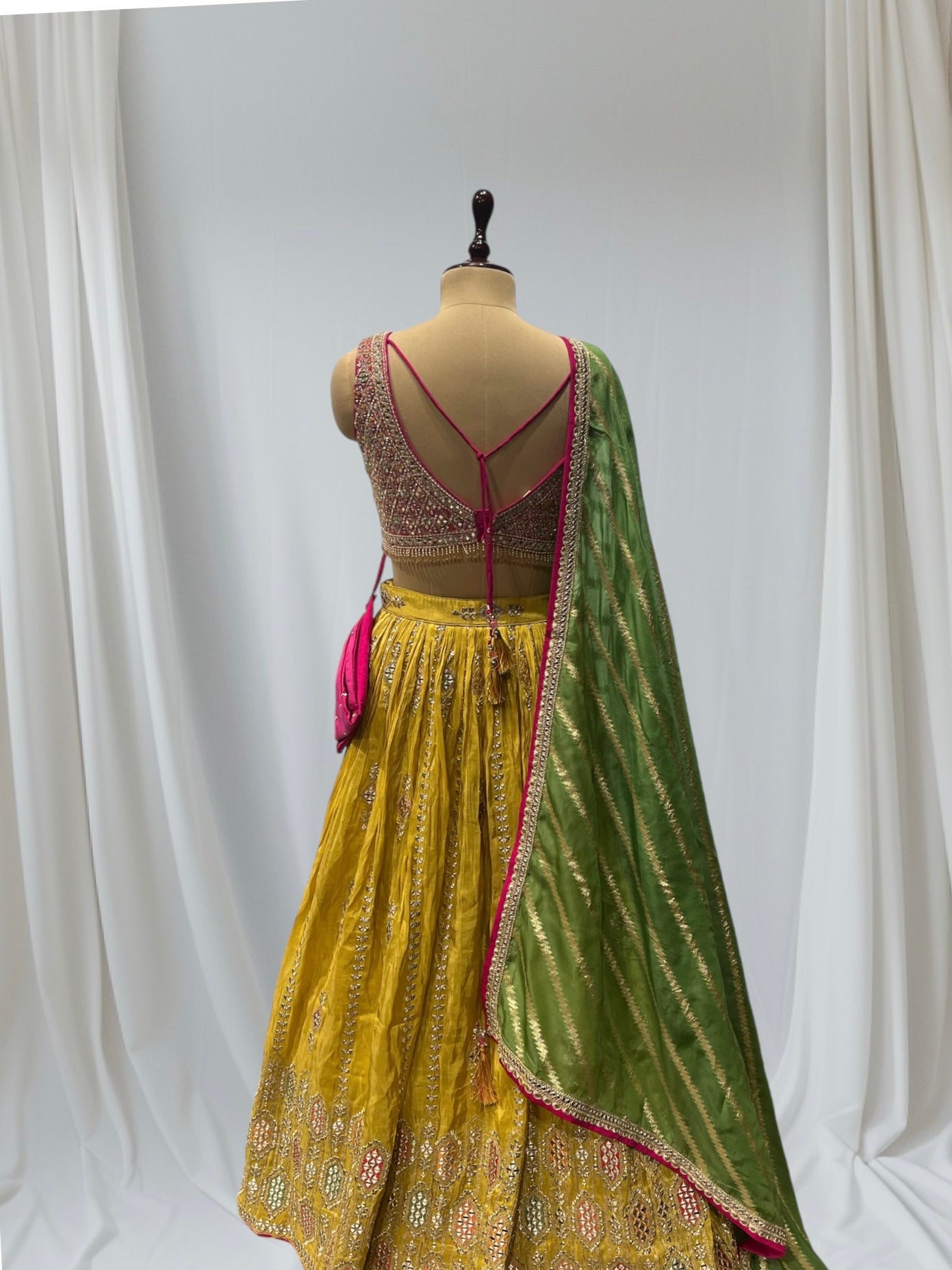 MUSTARD YELLOW SILK LEHENGA WITH SEQUINS  & BEADED V-NECK CROP TOP WITH GREEN DUPATTA