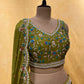 MEHANDI GREEN COLOR CHINON SKIRT WITH CROP TOP BLOUSE EMBELLISHED WITH PEARL, CUTDANA & BEADS WORK