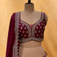 DARK WINE COLOUR CHINON LEHENGA WITH CROP TOP BLOUSE EMBELLISHED WITH CUTDANA, SEQUINS & ZARI EMBROIDERY