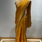 MUSTARD COLOUR SATIN SILK BANARASI SAREE EMBELLISHED WITH ZARI WEAVES