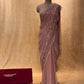 ( DELIVERY IN 25 DAYS ) PEACH COLOUR CHIFFON HAND EMBROIDERED SAREE EMBELLISHED WITH SEQUINS, CUTDANA & BEADS WORK