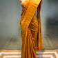 MUSTARD COLOUR TUSSAR SILK HAND EMBROIDERED SAREE EMBELLISHED WITH SEQUINS & ZARDOZI WORK