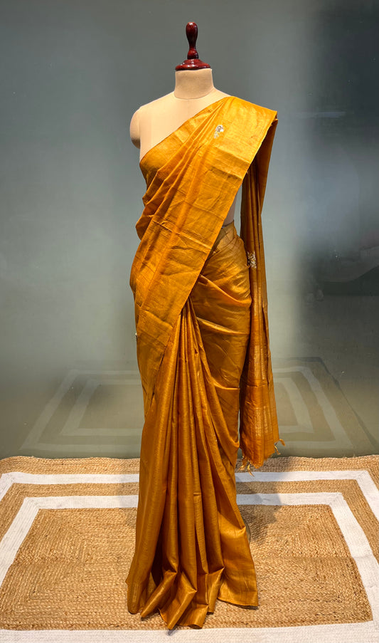 MUSTARD COLOUR TUSSAR SILK HAND EMBROIDERED SAREE EMBELLISHED WITH SEQUINS & ZARDOZI WORK