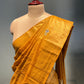 MUSTARD COLOUR TUSSAR SILK HAND EMBROIDERED SAREE EMBELLISHED WITH SEQUINS & ZARDOZI WORK