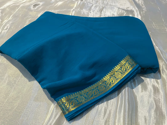 TURQUOISE COLOUR CHIFFON SAREE WITH ZARI BORDER