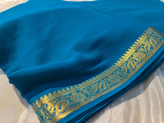 TURQUOISE COLOUR CHIFFON SAREE WITH ZARI BORDER