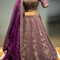 ( DELIVERY IN 20-25 DAYS ) PURPLE COLOUR SILK EMBROIDERED LEHENGA WITH ORGANZA DUPATTA EMBELLISHED WITH ZARI & SEQUINS WORK