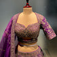 ( DELIVERY IN 20-25 DAYS ) PURPLE COLOUR SILK EMBROIDERED LEHENGA WITH ORGANZA DUPATTA EMBELLISHED WITH ZARI & SEQUINS WORK