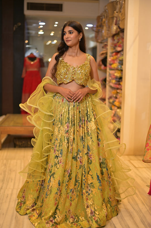 ( DELIVERY IN 25 DAYS ) PASTEL GREEN COLOUR IMPORTED CRUSHED LEHENGA WITH DESIGNER CROP TOP BLOUSE EMBELLISHED WITH GOLDEN FOIL WORK