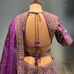 ( DELIVERY IN 20-25 DAYS ) PURPLE COLOUR SILK EMBROIDERED LEHENGA WITH ORGANZA DUPATTA EMBELLISHED WITH ZARI & SEQUINS WORK