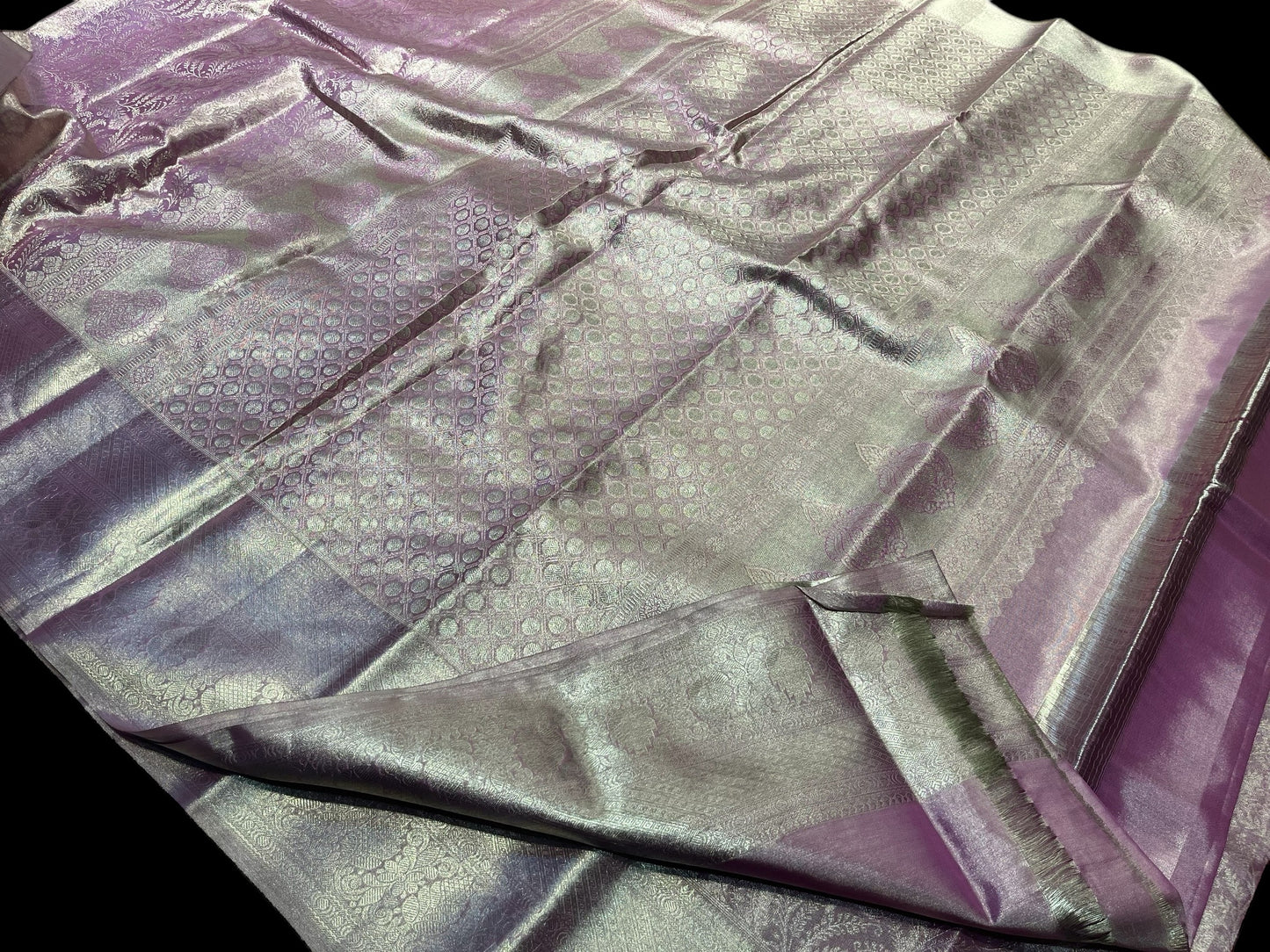 A LAVENDER PURE KANJIVARAM SILK SAREE WITH INTRICATE SILVER ZARI WORK