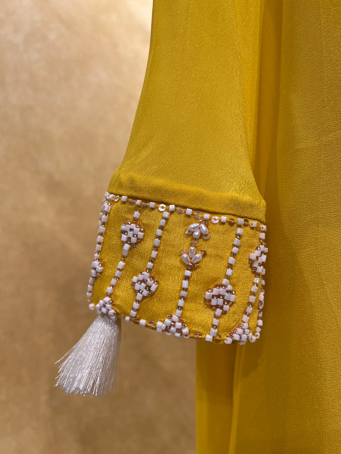 YELLOW COLOUR CREPE SILK PALAZZO PANT WITH EMBROIDERED KURTA EMBELLISHED WITH BEADS WORK