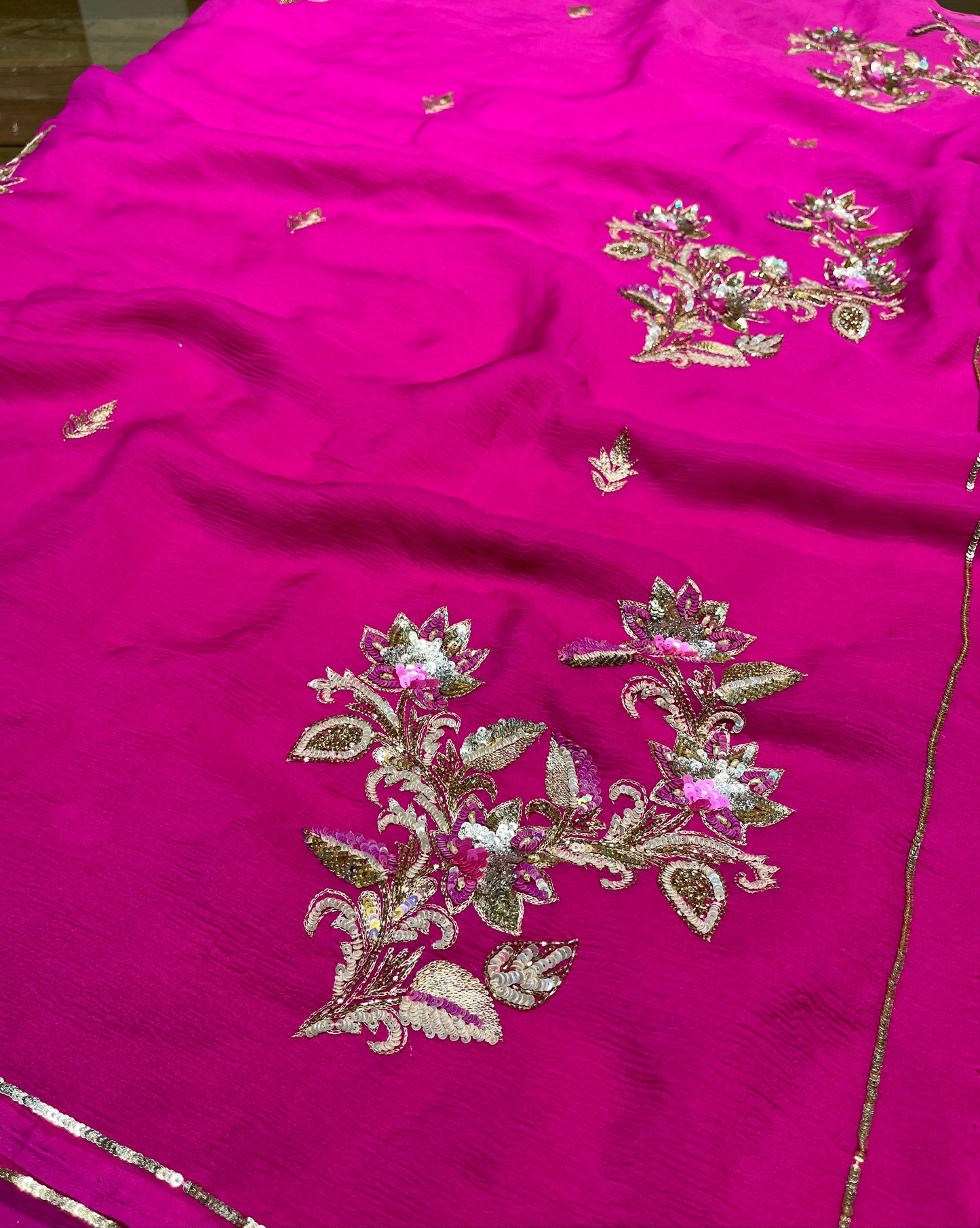 FUCHSIA PINK SHADED CHIFFON HAND EMBROIDERED SAREE WITH CREPE SILK BLOUSE EMBELLISHED WITH AARI, SEQUINS & CUTDANA WORK