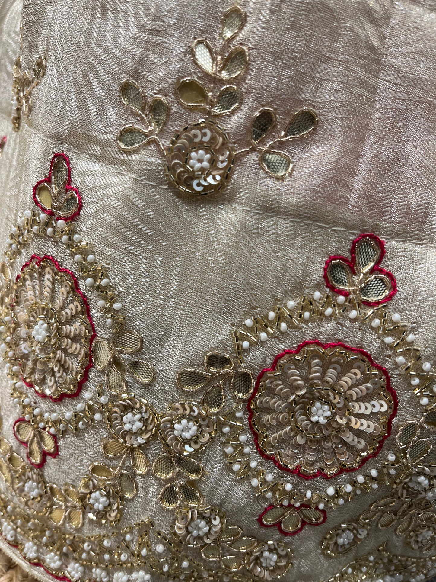 CREAM TISSUE LEHENGA WITH GOTA PATTI EMBROIDERY AND BANDHEJ DUPATTA